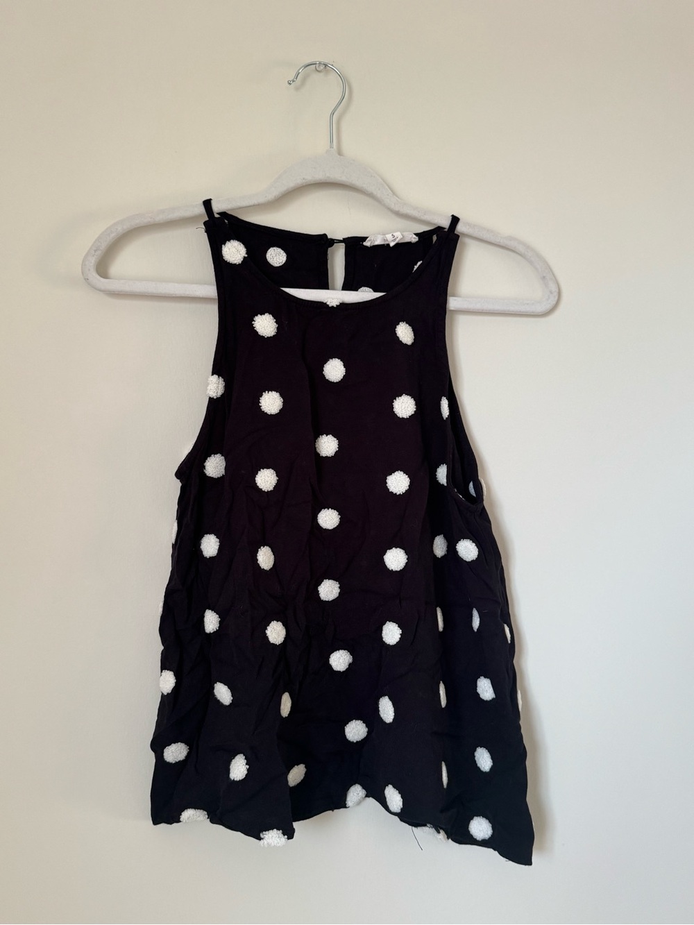 Black Polka Dot Sleeveless Tank Top with White Pom Accents